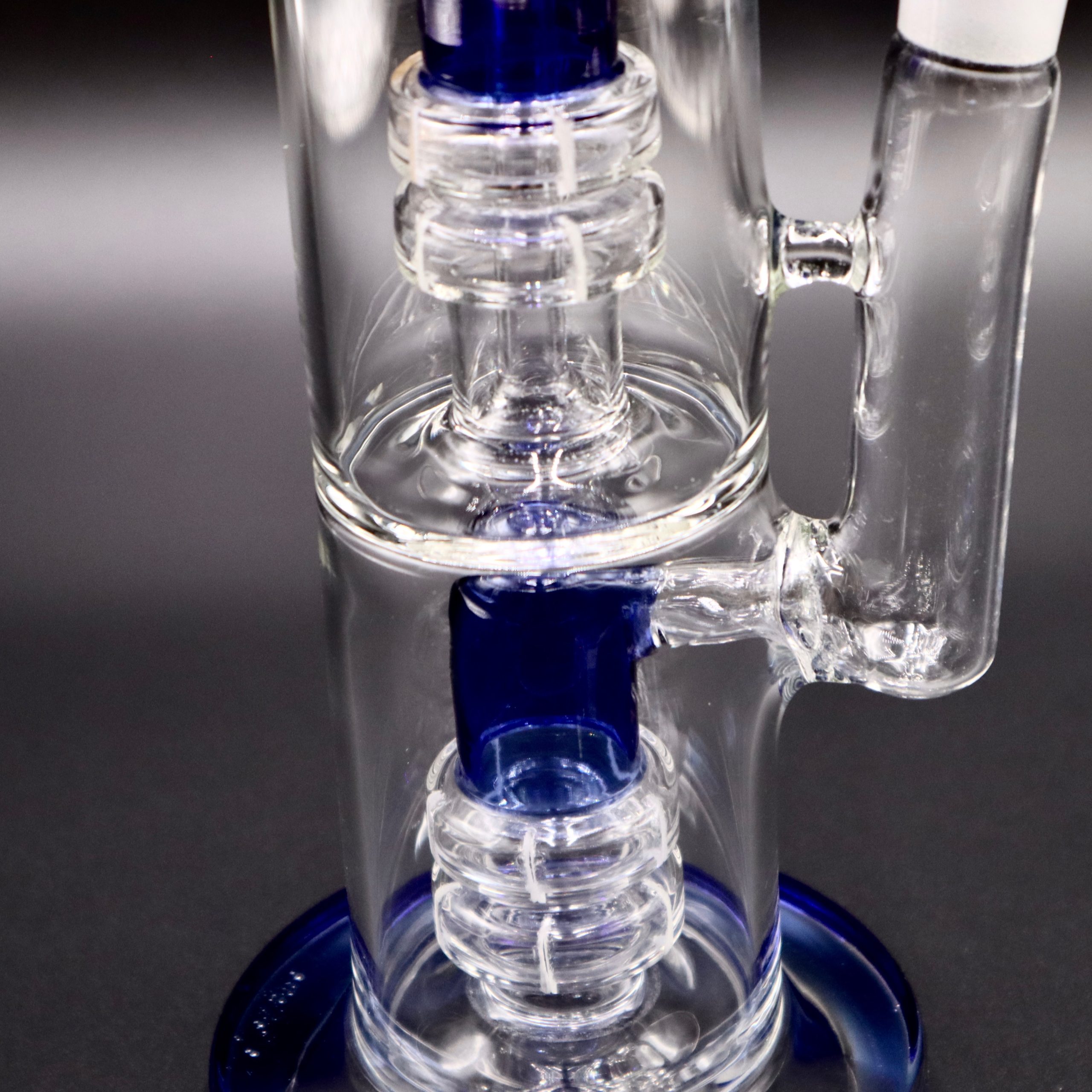 https://topfivewholesale.com/wp-content/uploads/2022/10/GL036-16%E2%80%B3-Water-Pipe-Double-Chamber-Spiral-Percolator-Blue-up-close.jpg